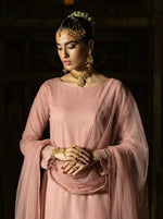 ROZAIB Dusty Pink luxury Bareeze net long shirt stitched suit. This premium ready to wear stitched dress features a modern rounded hem design, ultra-fine 0.3mm micro-net texture, and master-tailored straight sleeves with fine lace detailing. A minimalist 3-piece stitched suit for women in a muted pastel rose tone, paired with raw silk cigarette trousers and an airy Bareeze net dupatta. Perfect for a sophisticated festive look with high-definition tailoring.