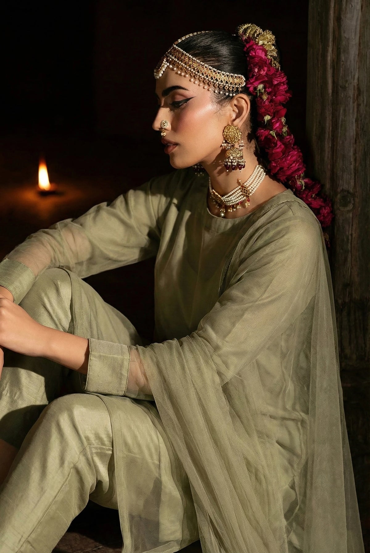 ROZAIB Olive Mist luxury Bareeze net long straight kurta stitched suit. This premium ready to wear stitched dress features unique structured cuff-stitch detailing, ultra-fine micro-mesh fabric, and master-tailored vertical seams. A minimalist 3-piece stitched suit for women in a muted earthy olive tone, paired with raw silk cigarette trousers and a lightweight Bareeze net dupatta. Designed for a calm and sophisticated festive look with zero embroidery.