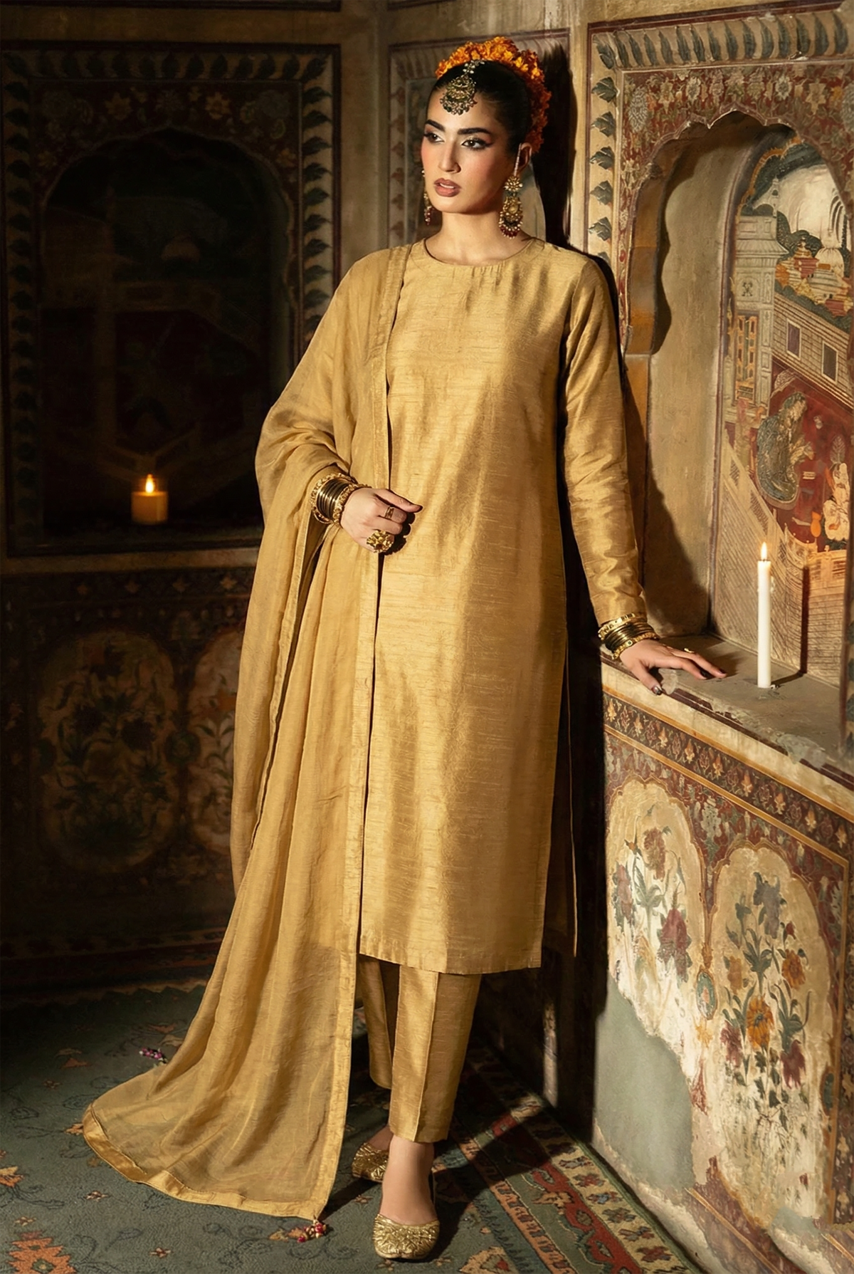 ROZAIB Antique Gold executive stitched suit in premium raw silk. This luxury ready to wear stitched dress features a straight tailored fit with authentic silk grain texture and master-tailored seams. A minimalist 3-piece stitched suit for women designed for a sophisticated heritage look, paired with raw silk cigarette pants and a fluid chiffon dupatta. Perfect for executive formal events and festive gatherings.