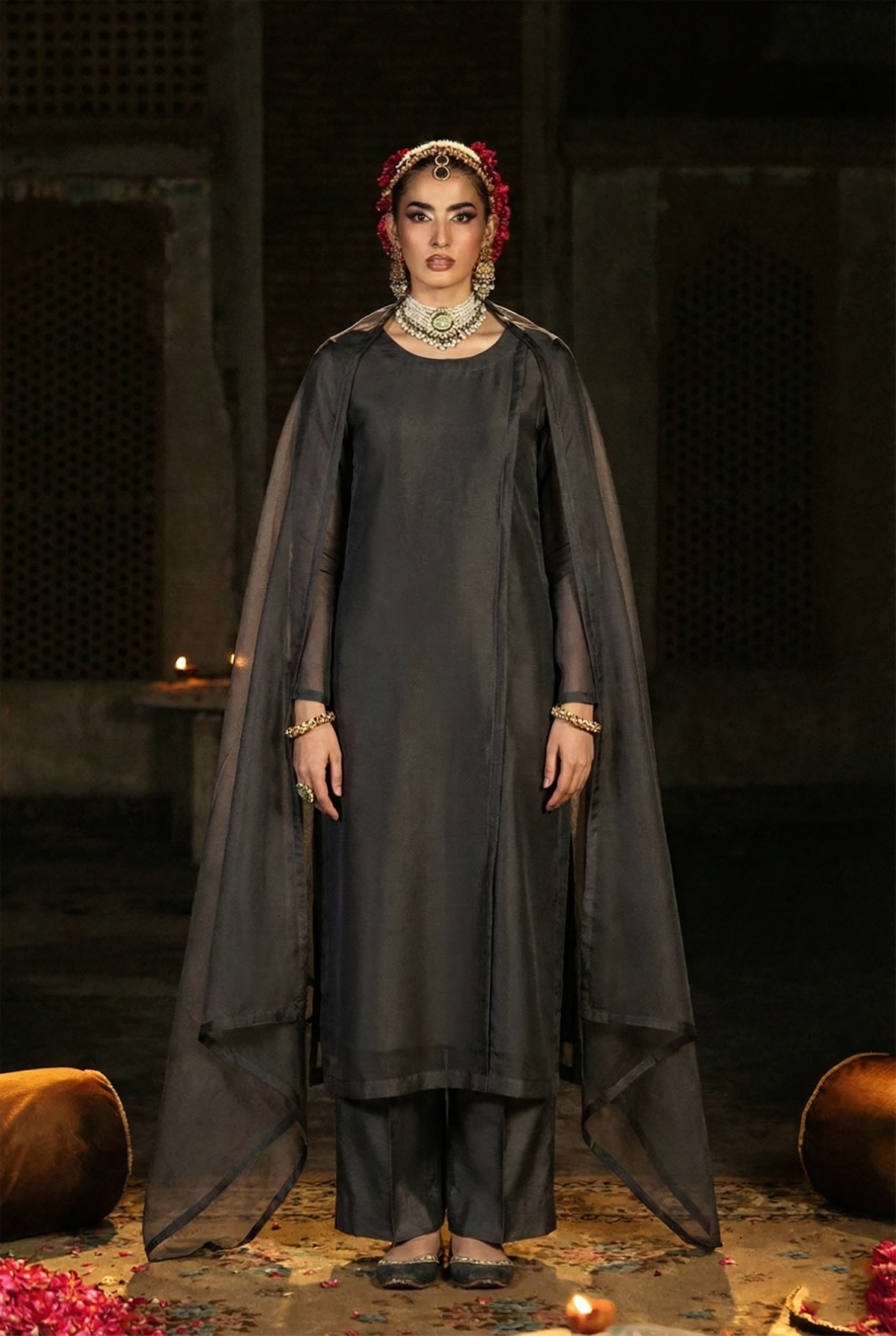 ROZAIB Anthracite Coal designer stitched suit in premium organza fabric. This luxury ready to wear stitched dress features architectural floating spine stitching and master tailoring. A minimalist 3-piece stitched suit for women, perfect for executive office wear and festive occasions, paired with raw silk trousers and a matching organza dupatta.