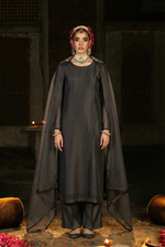 ROZAIB Anthracite Coal designer stitched suit in premium organza fabric. This luxury ready to wear stitched dress features architectural floating spine stitching and master tailoring. A minimalist 3-piece stitched suit for women, perfect for executive office wear and festive occasions, paired with raw silk trousers and a matching organza dupatta.