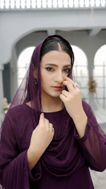 ROZAIB Eggplant luxury Bareeze net stitched suit for women. This premium ready to wear stitched dress features an architectural straight balance fit with 0.3mm micro-jali net texture and invisible frame construction. A minimalist 3-piece stitched suit in a deep violet-black eggplant tone, paired with raw silk loose shalwar and a matching Bareeze net dupatta. Designed for a rich, sophisticated evening look with zero embroidery.