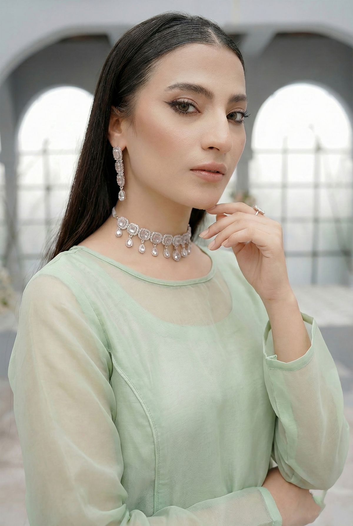 ROZAIB Pastel Green luxury A-line organza stitched suit. This premium ready to wear stitched dress features a soft structured A-line fit, ultra-fine crisp organza weave, and a master-tailored round neckline with self-fabric piping detail. A minimalist 3-piece stitched suit for women in a fresh mint-neutral tone, paired with raw silk cigarette trousers and a lightweight Bareeze net dupatta. Perfect for spring-summer festive daywear with zero embroidery.