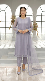 ROZAIB Lavender Grey luxury Bareeze net soft panel stitched suit. This premium ready to wear stitched dress features a 6-panel long frock silhouette with ultra-fine 0.3mm micro-mesh texture and master-tailored vertical panel lines. A minimalist 3-piece stitched suit for women in a cool muted lilac-grey tone, paired with raw silk cigarette trousers and an airy Bareeze net dupatta. Designed for a calm, sophisticated festive look with zero embroidery and precision stitching.