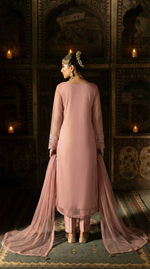 ROZAIB Dusty Pink luxury Bareeze net long shirt stitched suit. This premium ready to wear stitched dress features a modern rounded hem design, ultra-fine 0.3mm micro-net texture, and master-tailored straight sleeves with fine lace detailing. A minimalist 3-piece stitched suit for women in a muted pastel rose tone, paired with raw silk cigarette trousers and an airy Bareeze net dupatta. Perfect for a sophisticated festive look with high-definition tailoring.