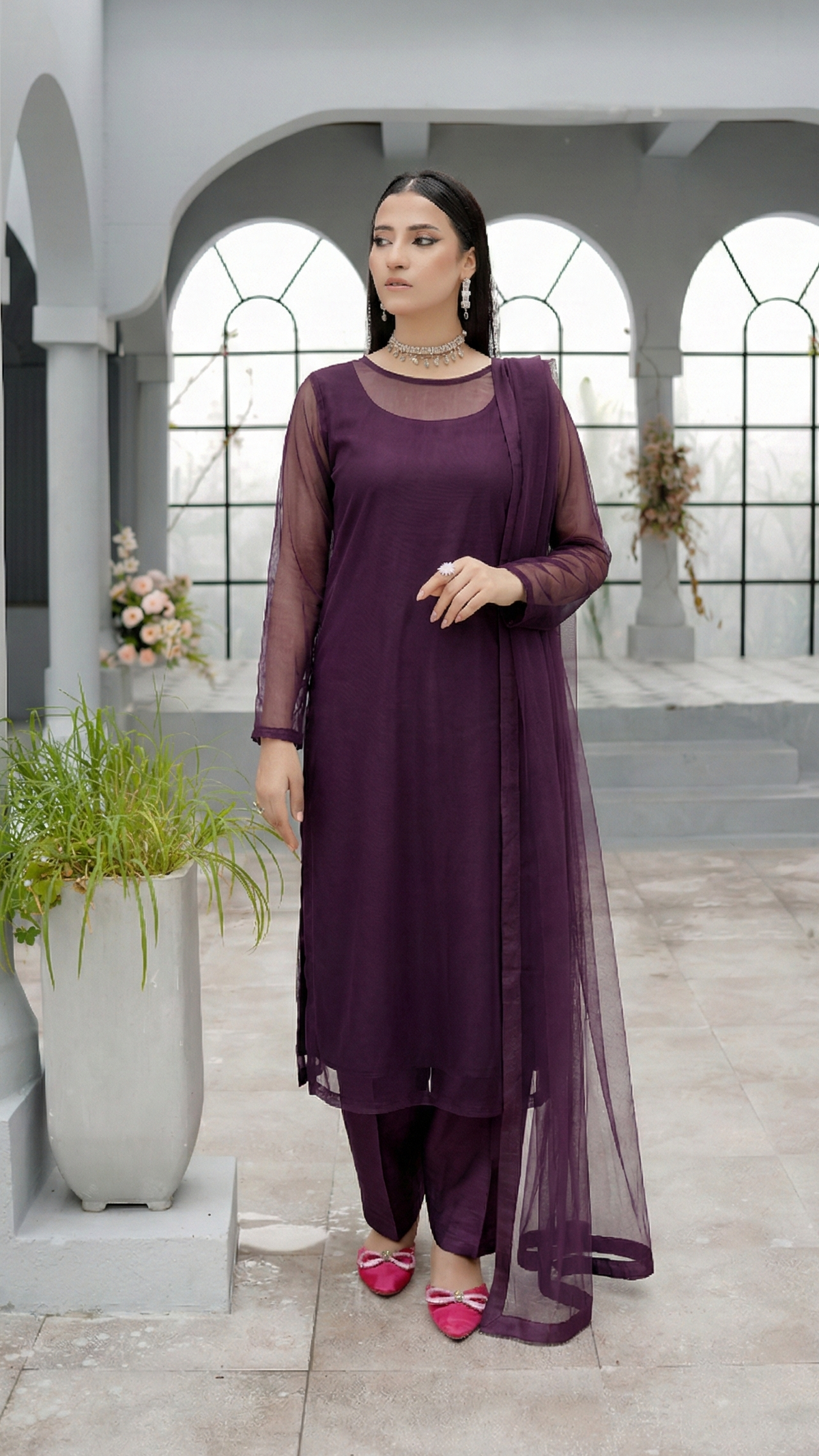 ROZAIB Eggplant luxury Bareeze net stitched suit for women. This premium ready to wear stitched dress features an architectural straight balance fit with 0.3mm micro-jali net texture and invisible frame construction. A minimalist 3-piece stitched suit in a deep violet-black eggplant tone, paired with raw silk loose shalwar and a matching Bareeze net dupatta. Designed for a rich, sophisticated evening look with zero embroidery.