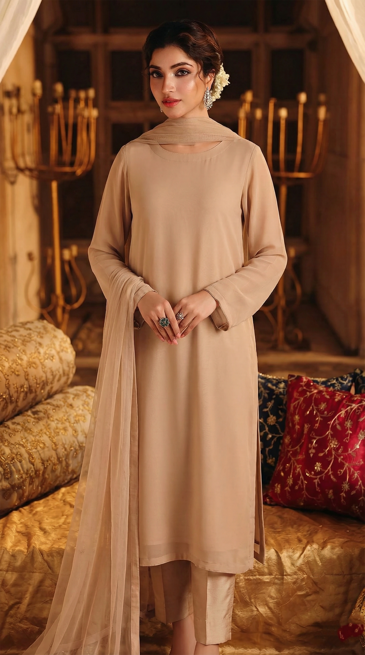 ROZAIB Nude Sand minimal festive stitched suit in premium flowy chiffon fabric. This luxury ready to wear stitched dress features a straight relaxed flow fit with ultra-fine micro chiffon grain and master-tailored vertical lines. A 3-piece stitched suit for women designed for effortless elegance, paired with raw silk cigarette trousers and a lightweight Bareeze net dupatta. Perfect for a sophisticated minimalist look in any season.