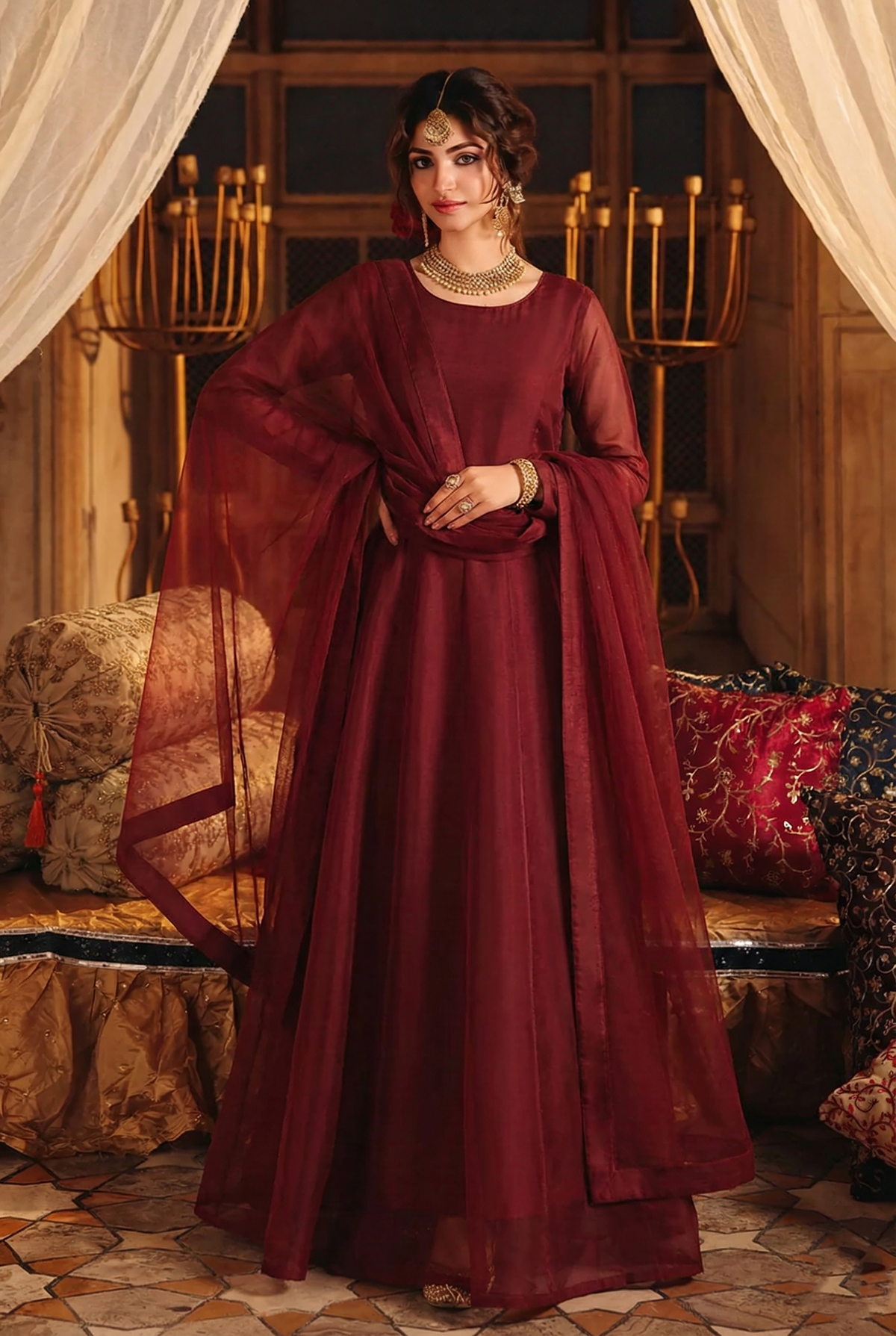 ROZAIB Deep Maroon luxury organza long frock stitched suit. This premium ready to wear stitched dress features a sophisticated light flare silhouette with 6-panel construction and sheer organza sleeves. A minimalist 3-piece stitched suit for women in a rich wine-red tone, paired with raw silk cigarette trousers and a lightweight Bareeze net dupatta. Designed for high-end festive evening wear with master-tailored pressed seams.